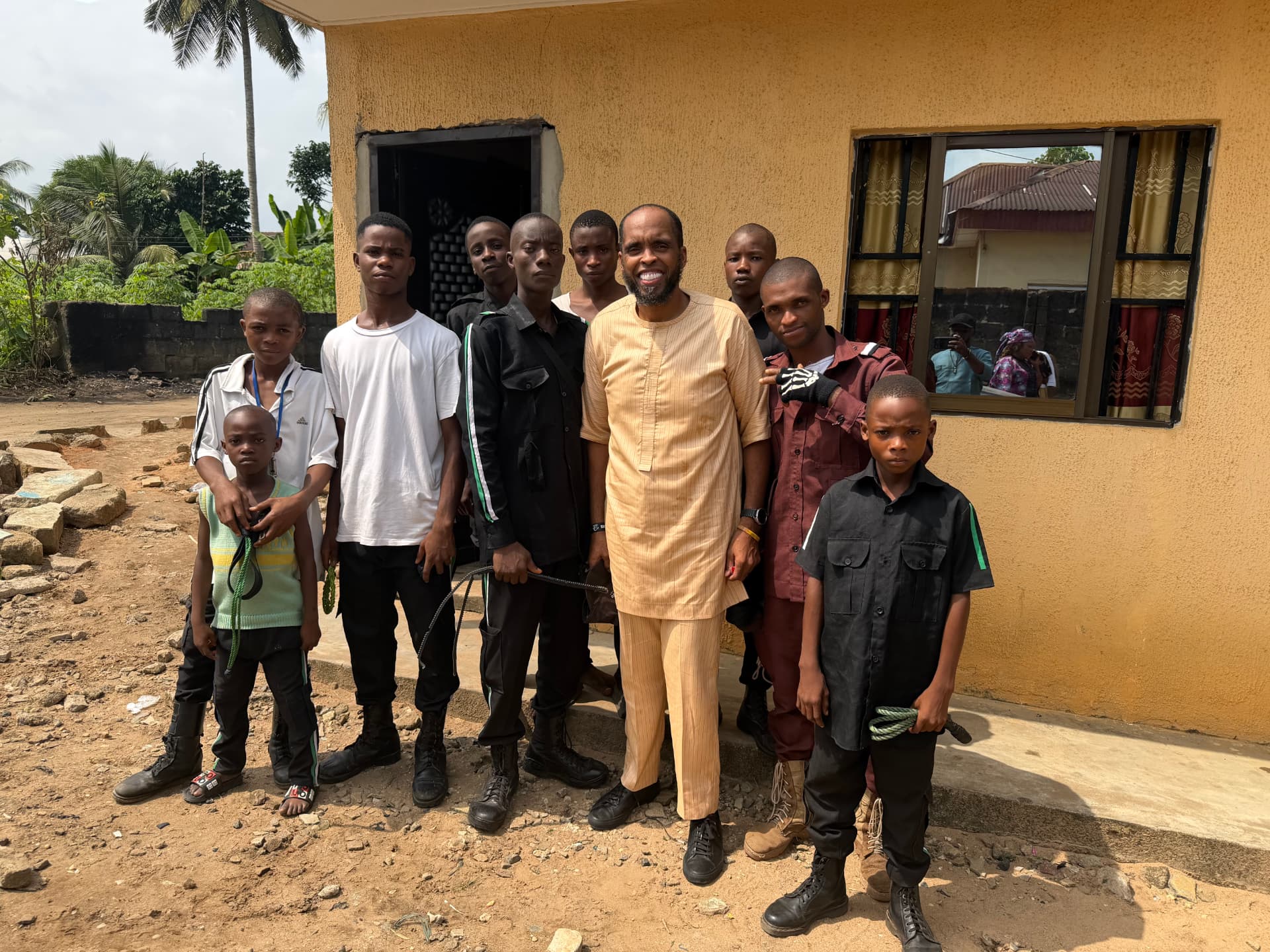 Pastor Dr. Earl Newton with young people in Nigeria